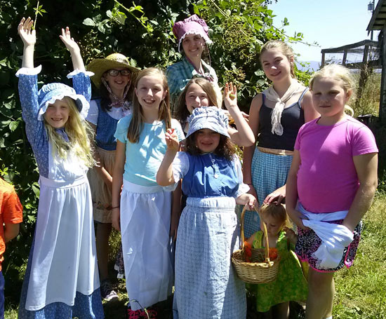 girls playing pioneer games at farm girl scouts