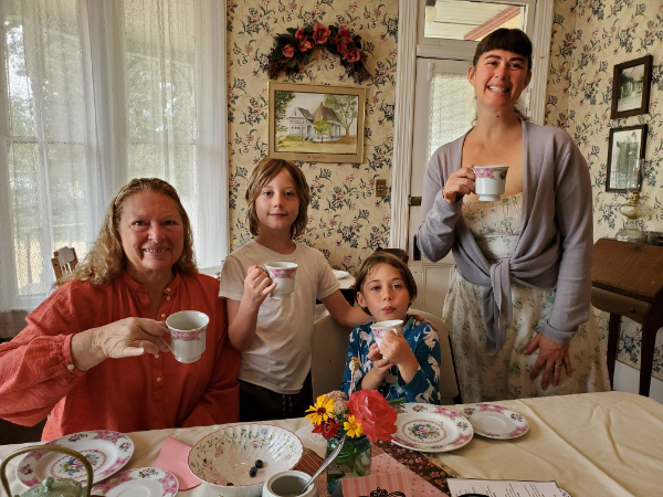 pouring tea for grandparents