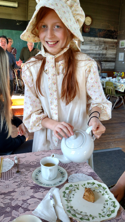 pouring tea for grandparents
