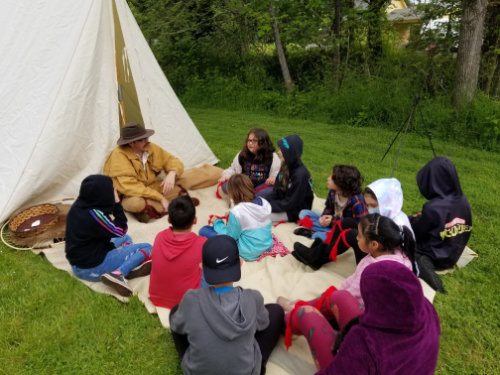 field trip trapper small trapper teaching kids at a field trip at Singing Creek Educational Center