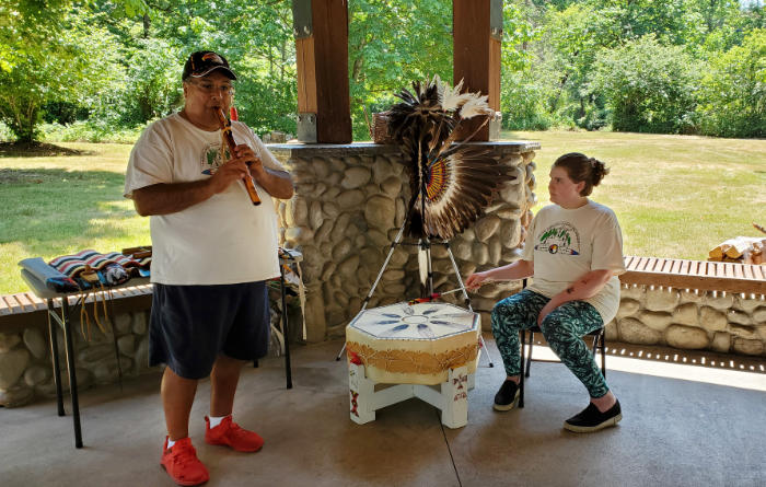 native american flute and drum at encampment