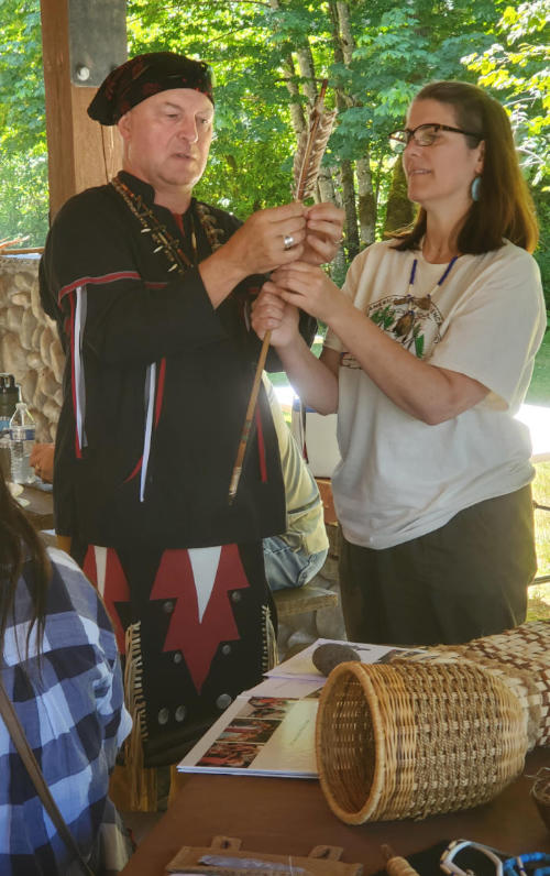 Karen and Alby working on an arrow native cultural