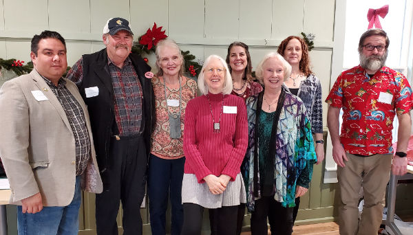 Board members at 2024 holiday party<br />