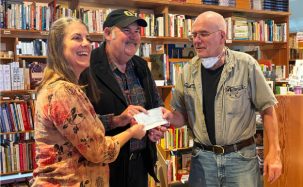 Steve and Karen accept ck for book