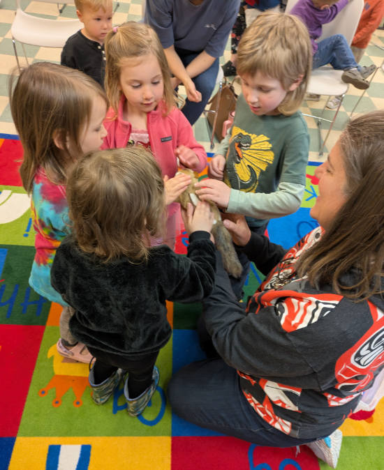 kids with stuffy at coyote stars w Karen