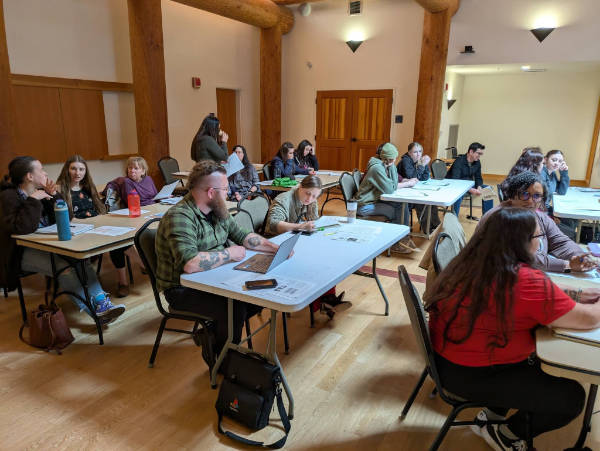 teachers working at a table indigenous day