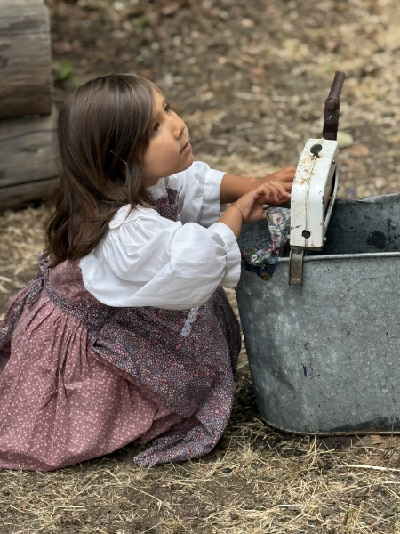 little girl at laundry washing cute