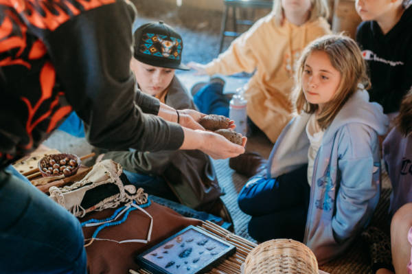 Instructor teaching Kalapuya ways with kids 2026
