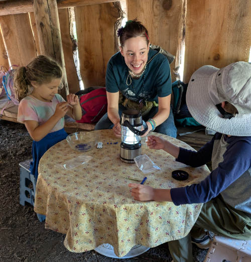 instructor with kids at camp