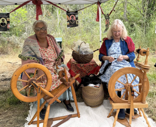 Arlene and Ann at festival spinning