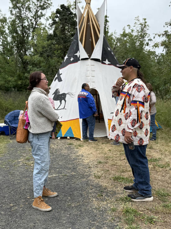 Deitz the younger talking to a woman