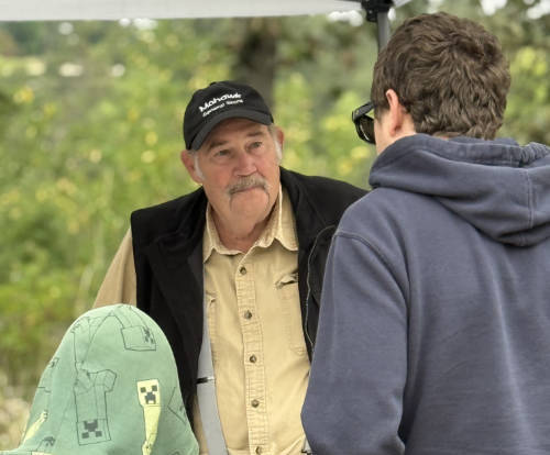 steve talking to guests at festival